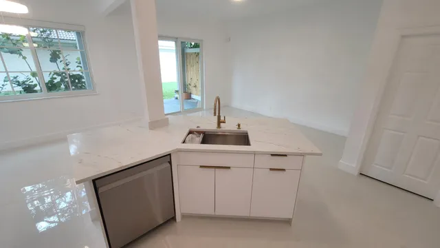 a sink with a mirror