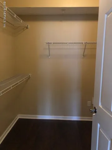 a view of a room with racks on the wall