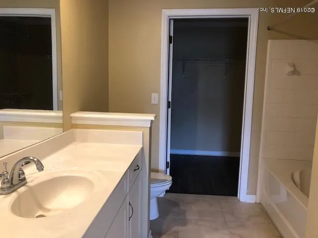 a bathroom with a sink and a bathtub