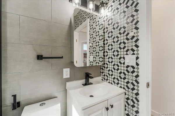 a bathroom with a sink and a toilet