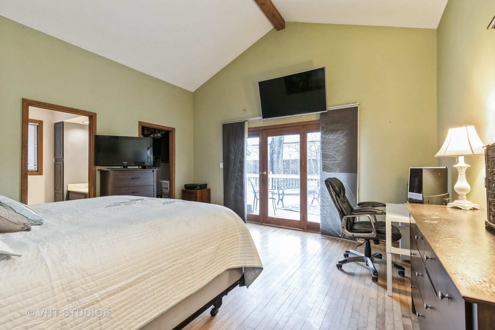 103 Beach Drive Algonquin, IL 60102 - Photo 16 of 21 a bedroom with a bed and a flat screen tv