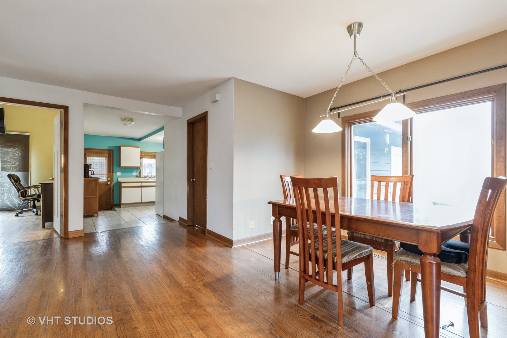 103 Beach Drive Algonquin, IL 60102 - Photo 10 of 21 a view of a dining room with furniture window and wooden floor