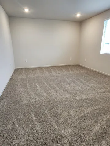 a bathroom with a double vanity sink and mirror