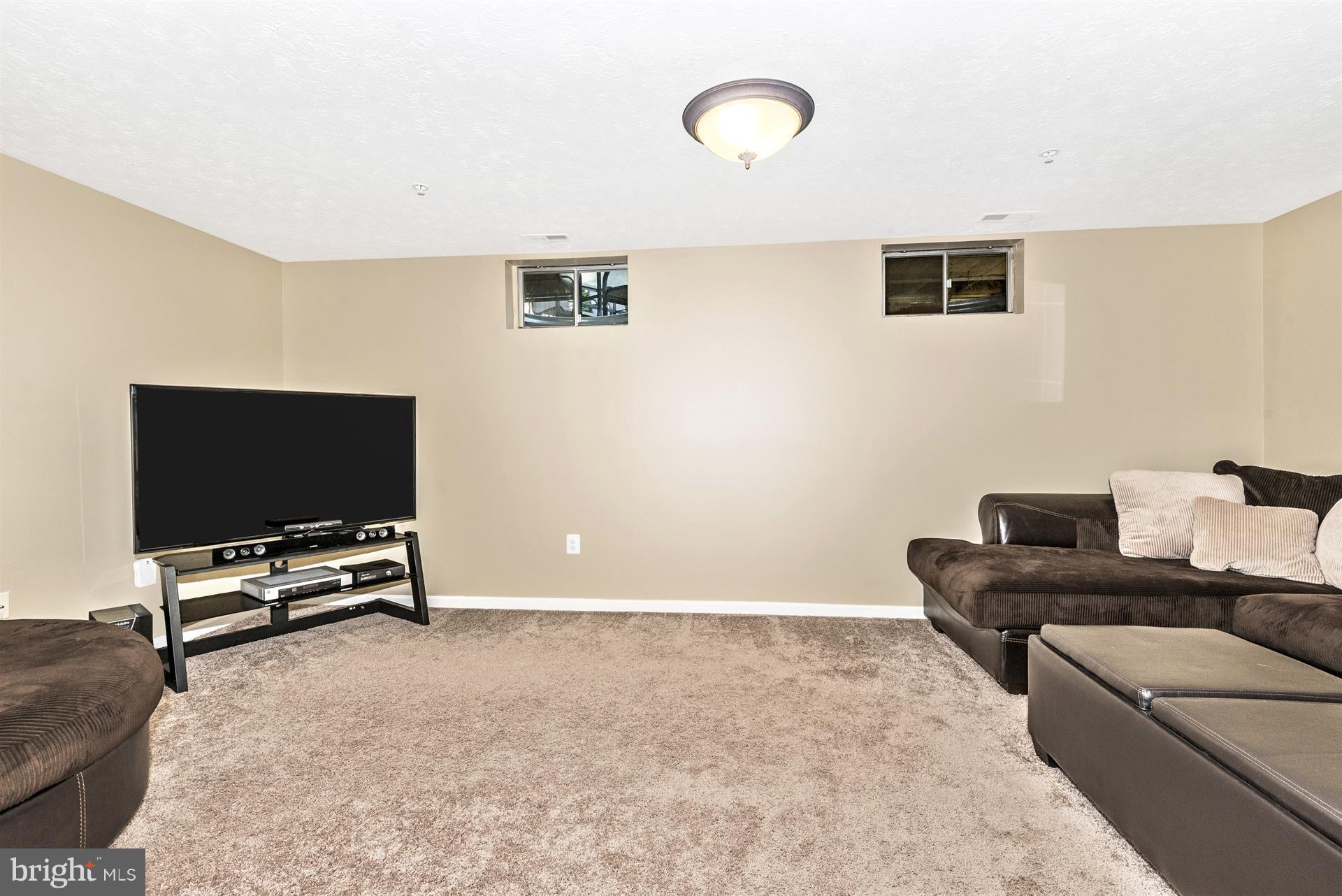 6101 Pine Ridge Terrace Frederick, MD 21701 - Photo 23 of 29 Lower level family room
