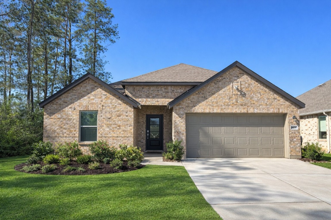 3105 Catalonion Court Conroe, TX 77301 - Photo 1 of 16 a view of a house with backyard