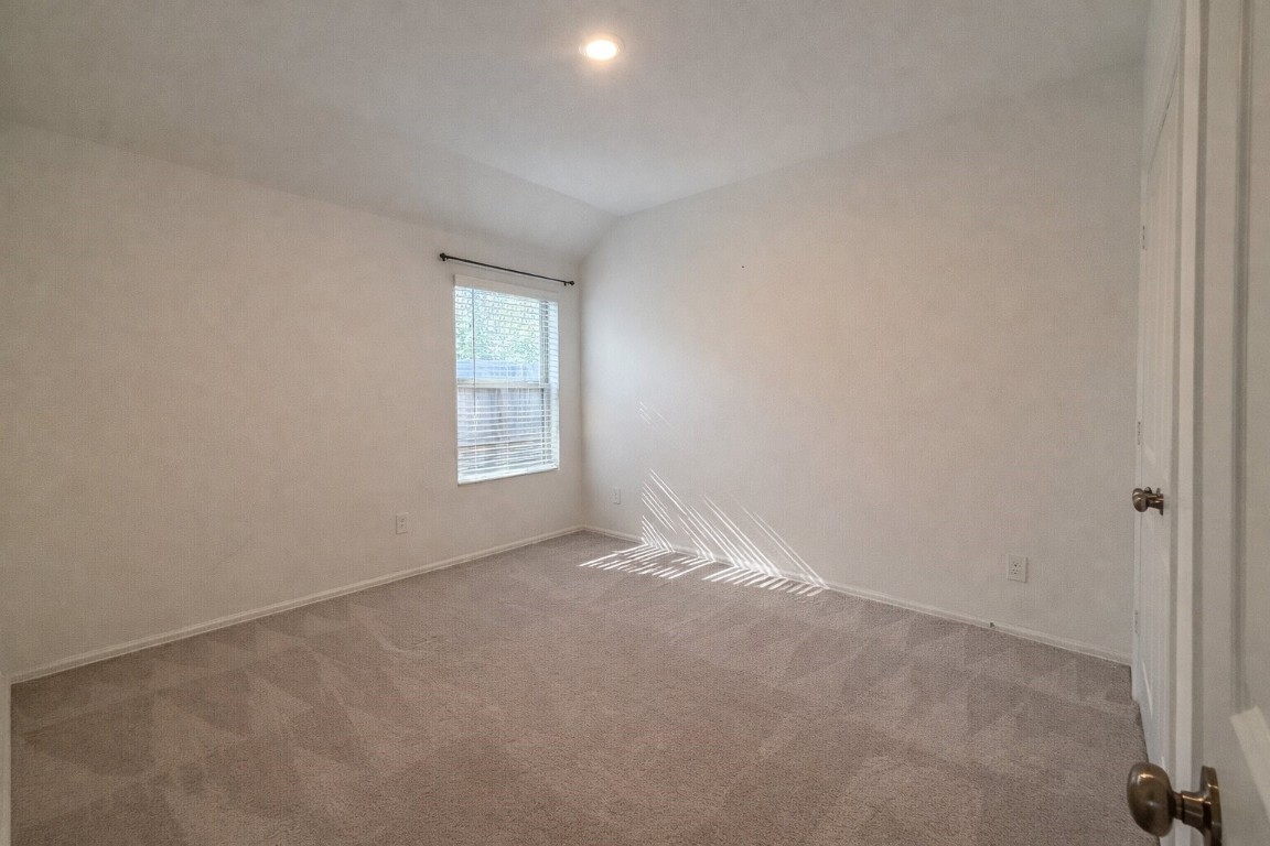 3105 Catalonion Court Conroe, TX 77301 - Photo 11 of 16 an empty room with windows