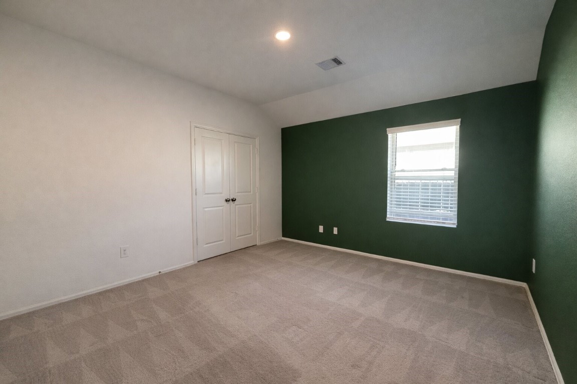 3105 Catalonion Court Conroe, TX 77301 - Photo 12 of 16 an empty room with windows
