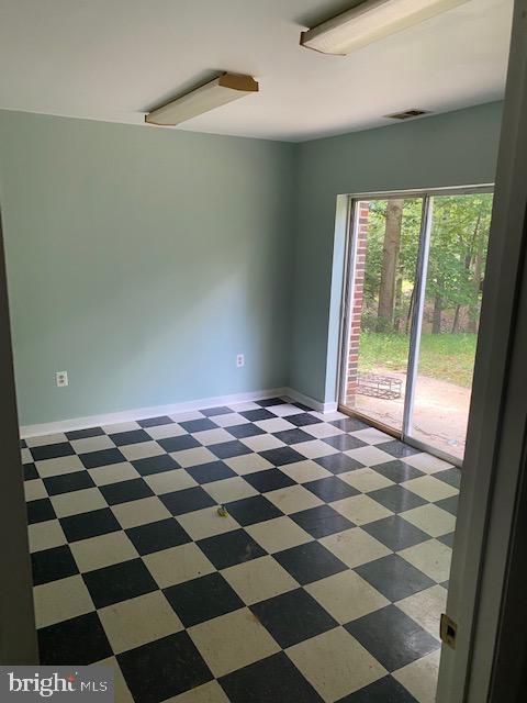 9290 Windrush Drive Lorton, VA 22079 - Photo 13 of 15 a black and white checkered floor