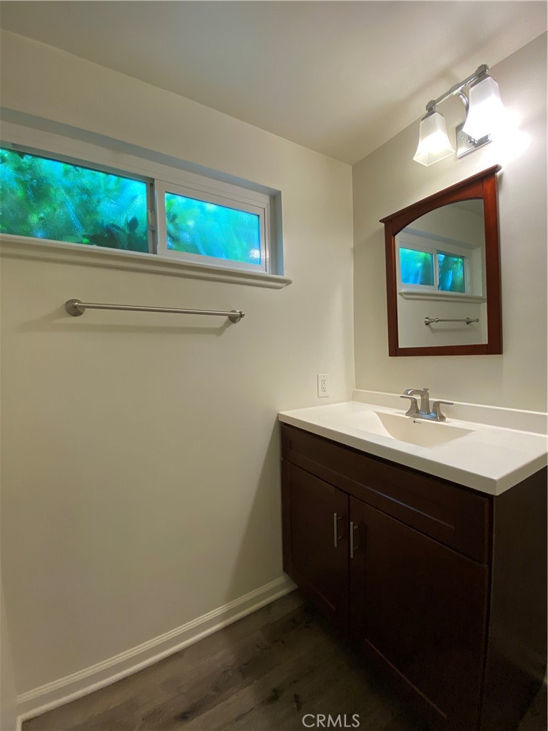 208 South Park View Street, Unit 2 Los Angeles, CA 90057 - Photo 13 of 24 a bathroom with a sink and a mirror