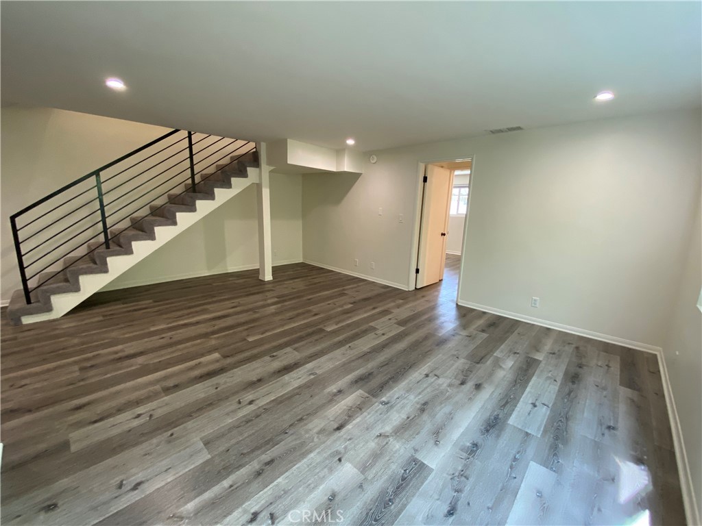 208 South Park View Street, Unit 2 Los Angeles, CA 90057 - Photo 8 of 24 a view of an empty room with wooden floor