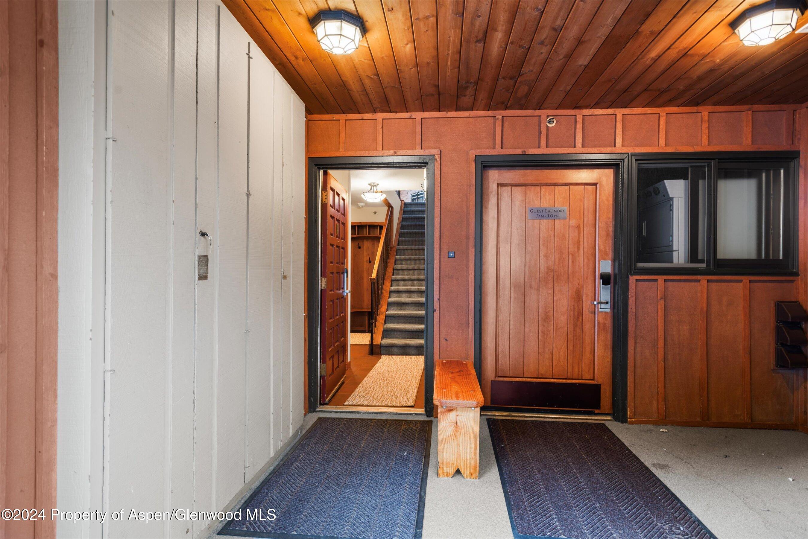 400 Wood Road, Unit 1207 Snowmass Village, CO 81615 - Photo 26 of 30 a view of front door with wooden floor