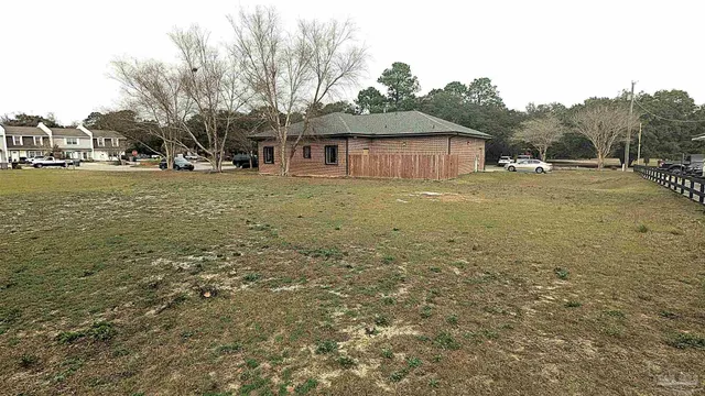 a view of house with outdoor space