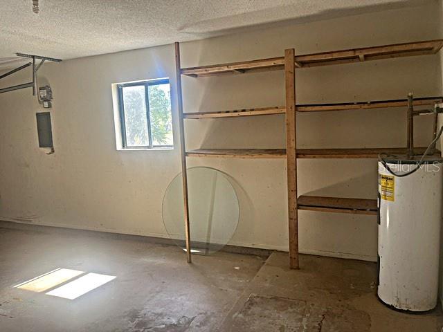 12 Pine Course Way Ocala, FL 34472 - Photo 26 of 29 a view of a room with racks on the wall and a window