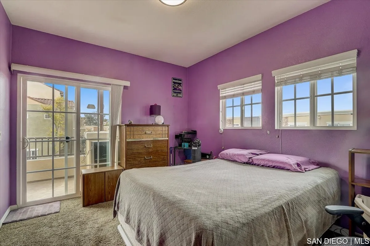 1213 Page Lane Santee, CA 92071 - Photo 14 of 21 a bedroom with a bed and wooden floor