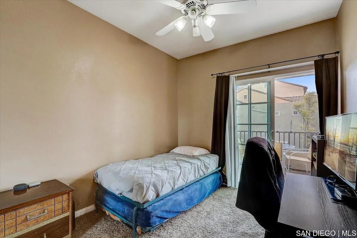 1213 Page Lane Santee, CA 92071 - Photo 15 of 21 a bedroom with a bed and a mirror