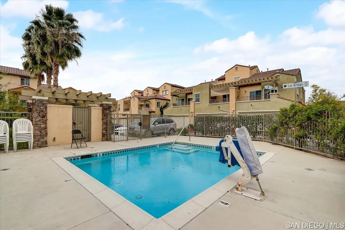 1213 Page Lane Santee, CA 92071 - Photo 19 of 21 a view of a swimming pool with a lounge chairs