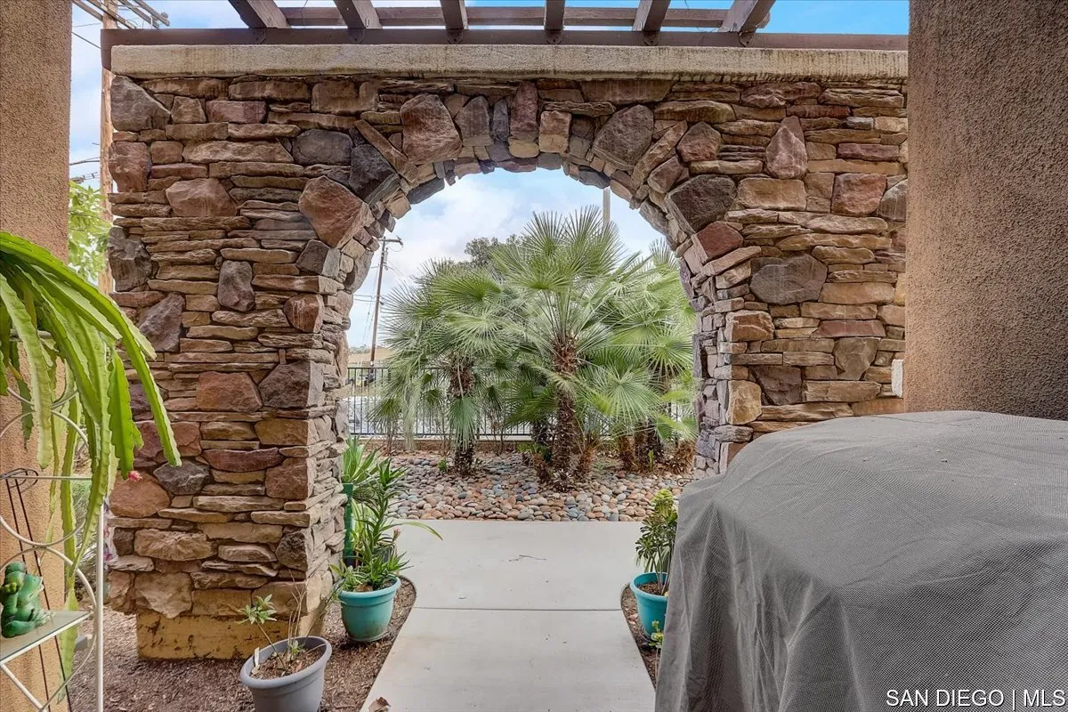 1213 Page Lane Santee, CA 92071 - Photo 3 of 21 a vase of flowers sitting on a table