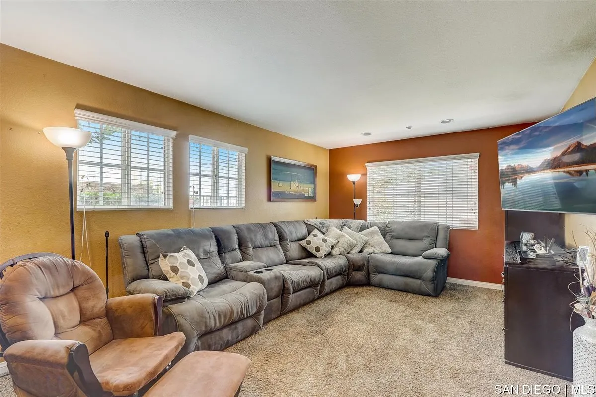 1213 Page Lane Santee, CA 92071 - Photo 4 of 21 a living room with furniture and a large window