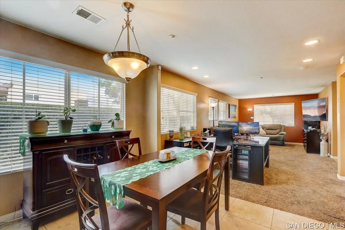 1213 Page Lane Santee, CA 92071 - Photo 5 of 21 a view of a dining room with furniture window and outside view