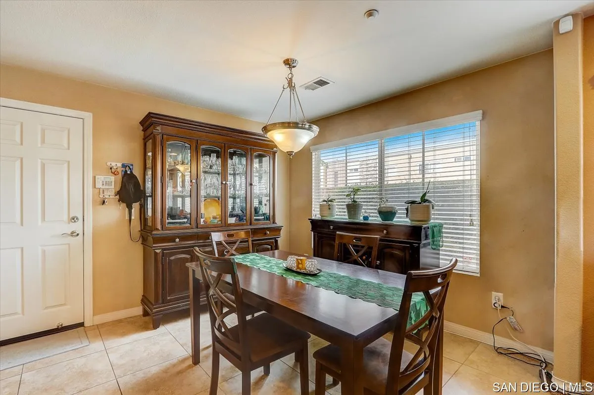 1213 Page Lane Santee, CA 92071 - Photo 6 of 21 a view of a dining room with furniture window and outside view