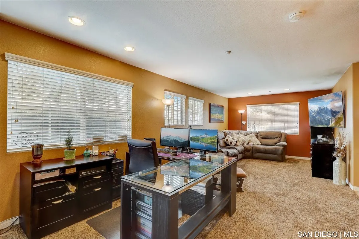 1213 Page Lane Santee, CA 92071 - Photo 10 of 21 a kitchen with stainless steel appliances granite countertop a stove and a refrigerator