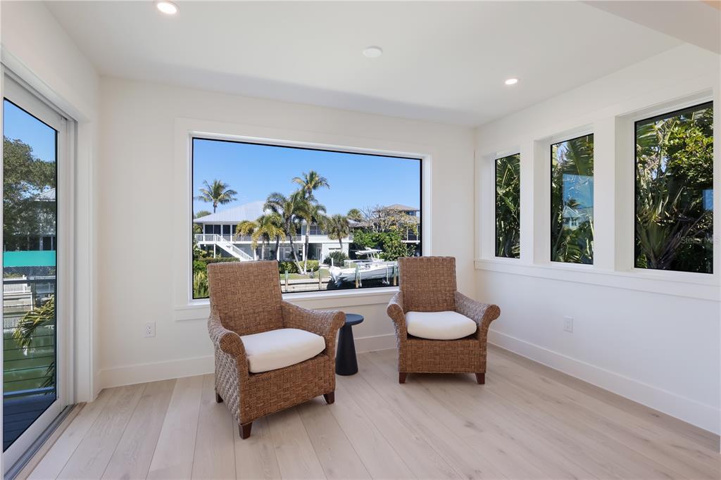 204 Waterway Avenue Boca Grande, FL 33921 - Photo 14 of 49 a living room with furniture and a large window
