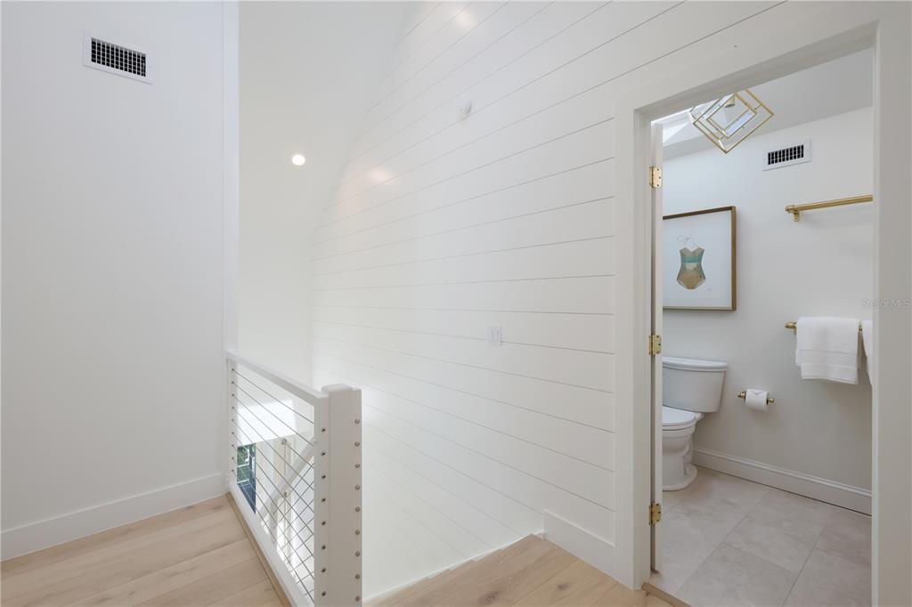 204 Waterway Avenue Boca Grande, FL 33921 - Photo 18 of 49 a bathroom with a toilet and a sink