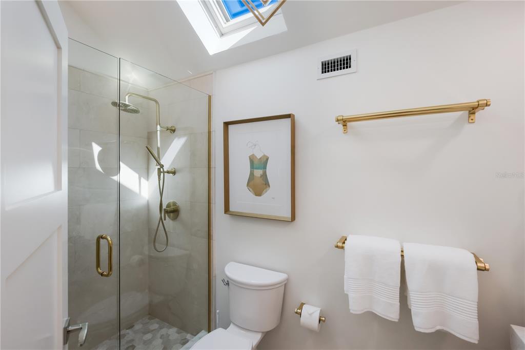204 Waterway Avenue Boca Grande, FL 33921 - Photo 19 of 49 a bathroom with a toilet and a shower