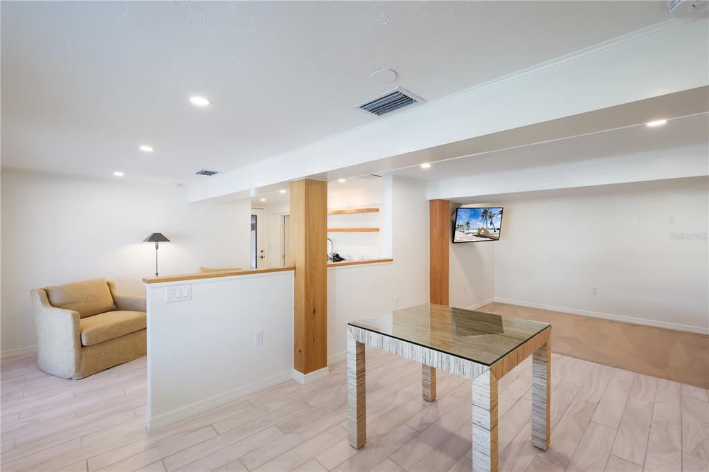 204 Waterway Avenue Boca Grande, FL 33921 - Photo 30 of 49 a room with furniture and a window