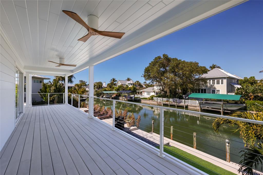 204 Waterway Avenue Boca Grande, FL 33921 - Photo 39 of 49 a view of a house with roof deck