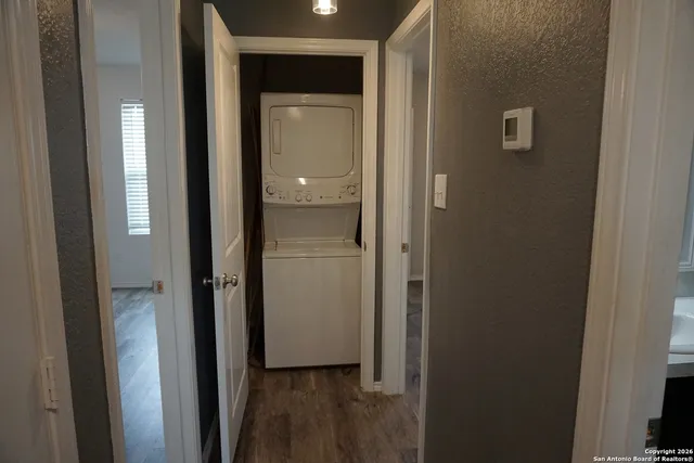 a view of a bathroom from a hallway