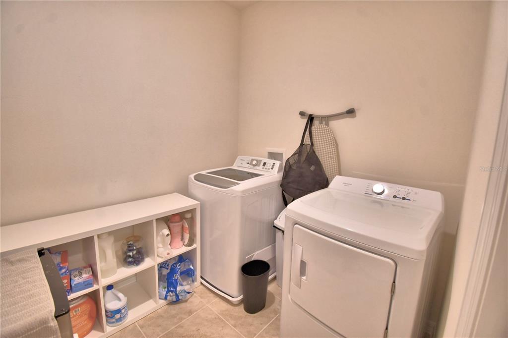 2839 Moulin Road Davenport, FL 33837 - Photo 46 of 75 a utility room with dryer and washer