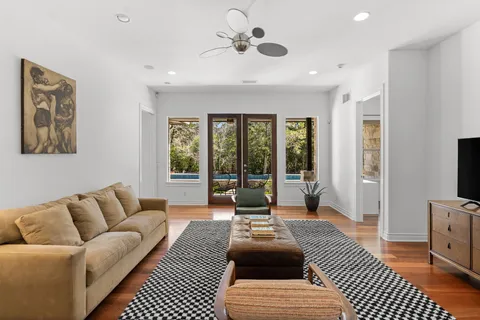 a view of an entryway with wooden floor