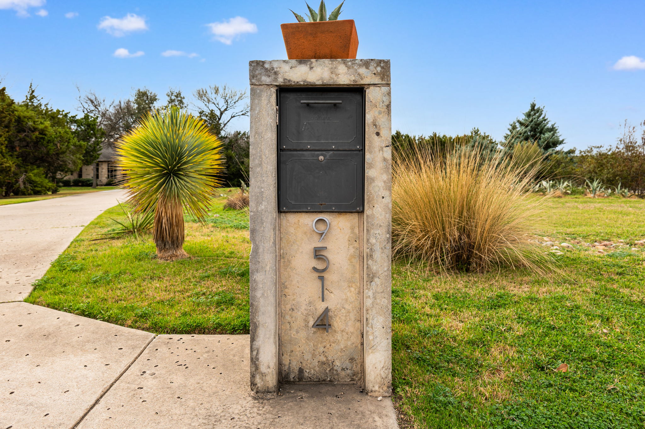 9514 San Lucas Road Austin, TX 78737 - Photo 38 of 38 a view of a pathway of a house with a yard