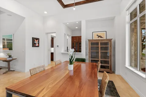 a room with wooden floor and furniture