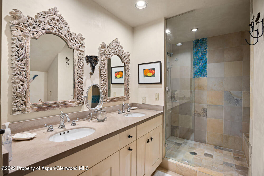 111 Neale Avenue Aspen, CO 81611 - Photo 13 of 30 a bathroom with a sink double vanity and a mirror