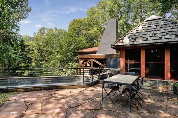 a view of house with outdoor seating space