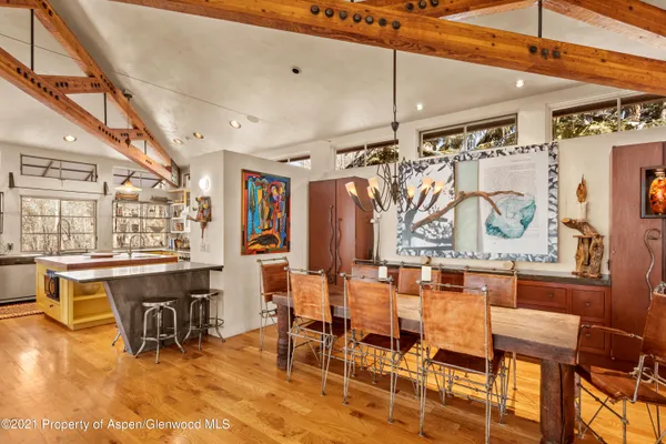 a view of a dining room with furniture