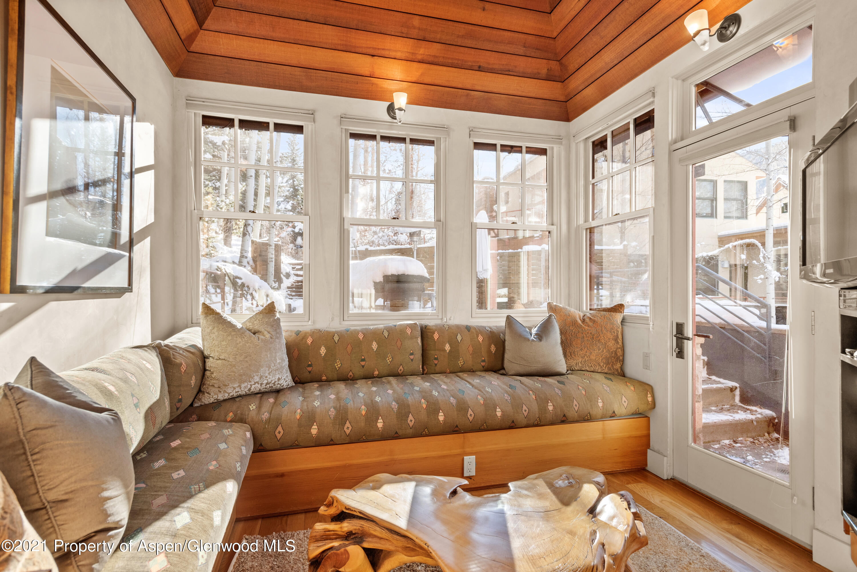 111 Neale Avenue Aspen, CO 81611 - Photo 9 of 30 a living room with furniture and a large window