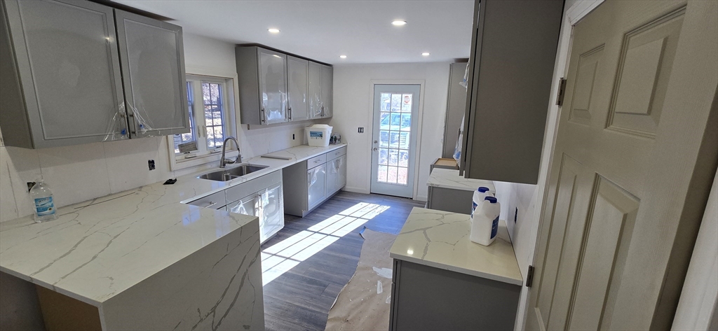 109 Mendon Road Sutton, MA 01590 - Photo 1 of 17 a large white kitchen with a large window