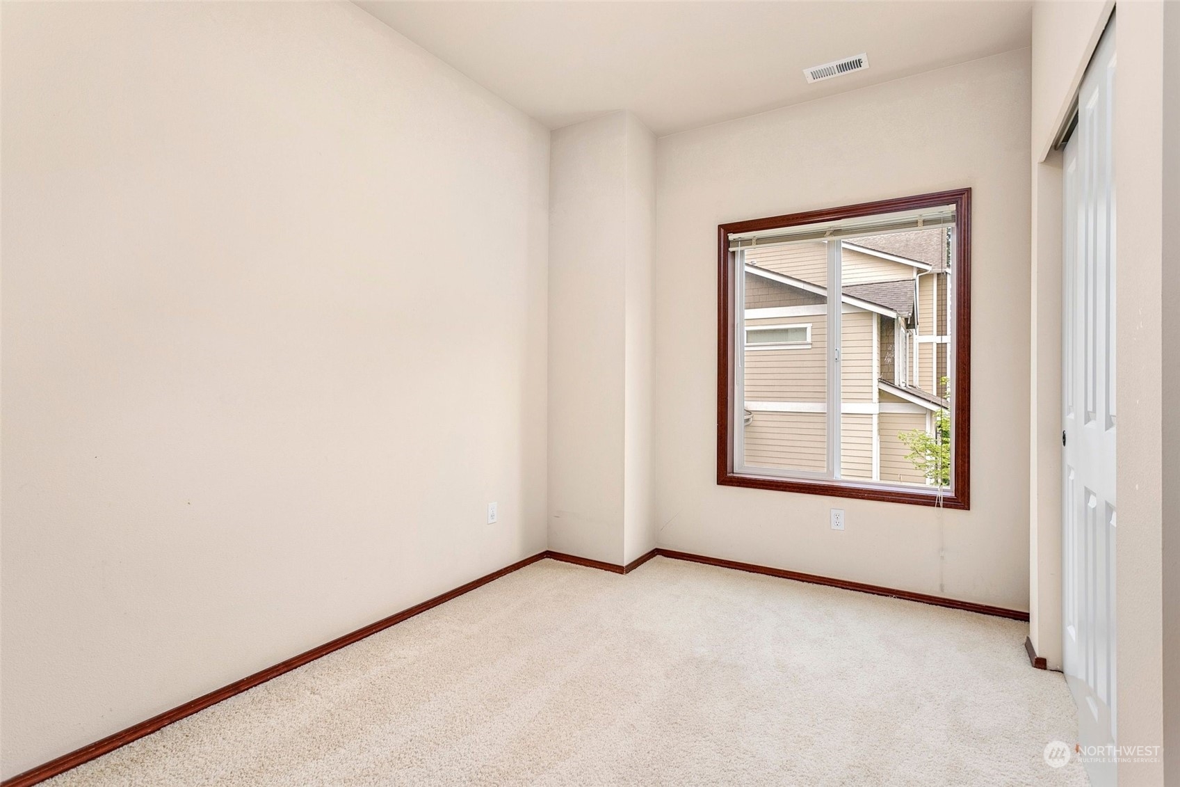 1137 215th Place Southeast Bothell, WA 98021 - Photo 13 of 30 an empty room with a window