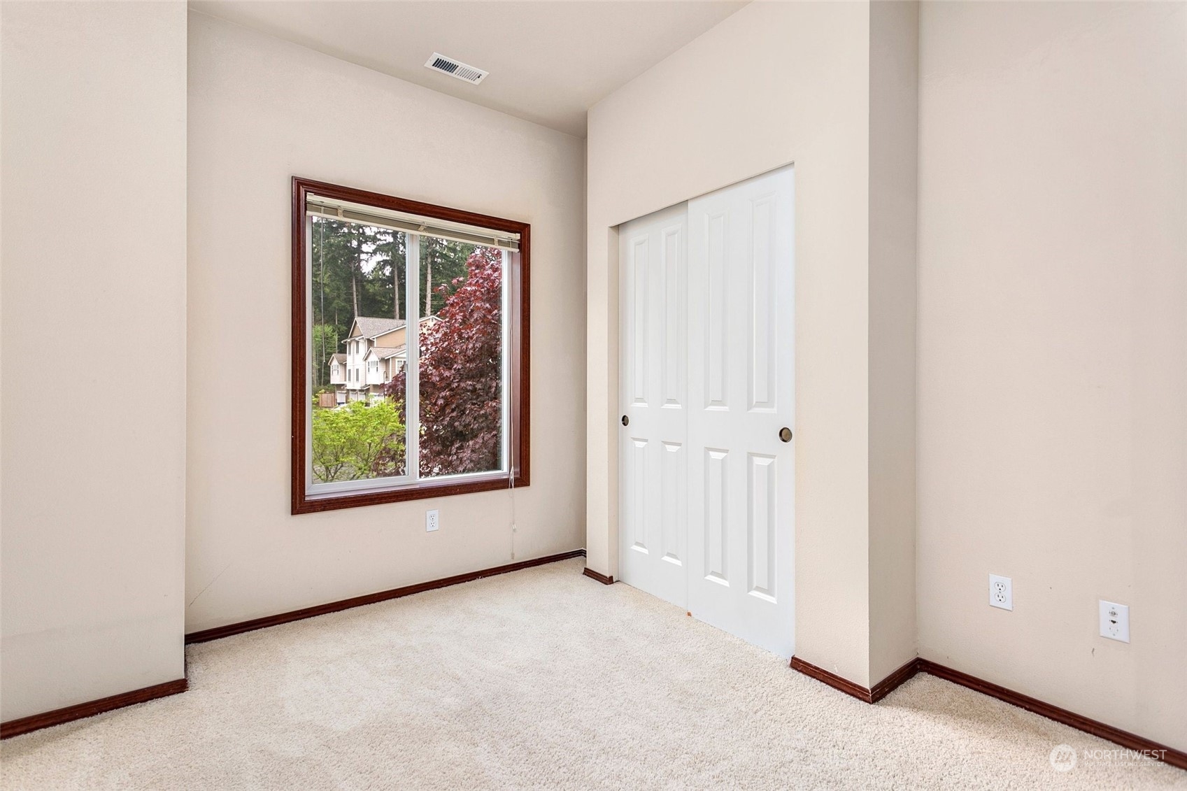 1137 215th Place Southeast Bothell, WA 98021 - Photo 14 of 30 an empty room with windows and closet