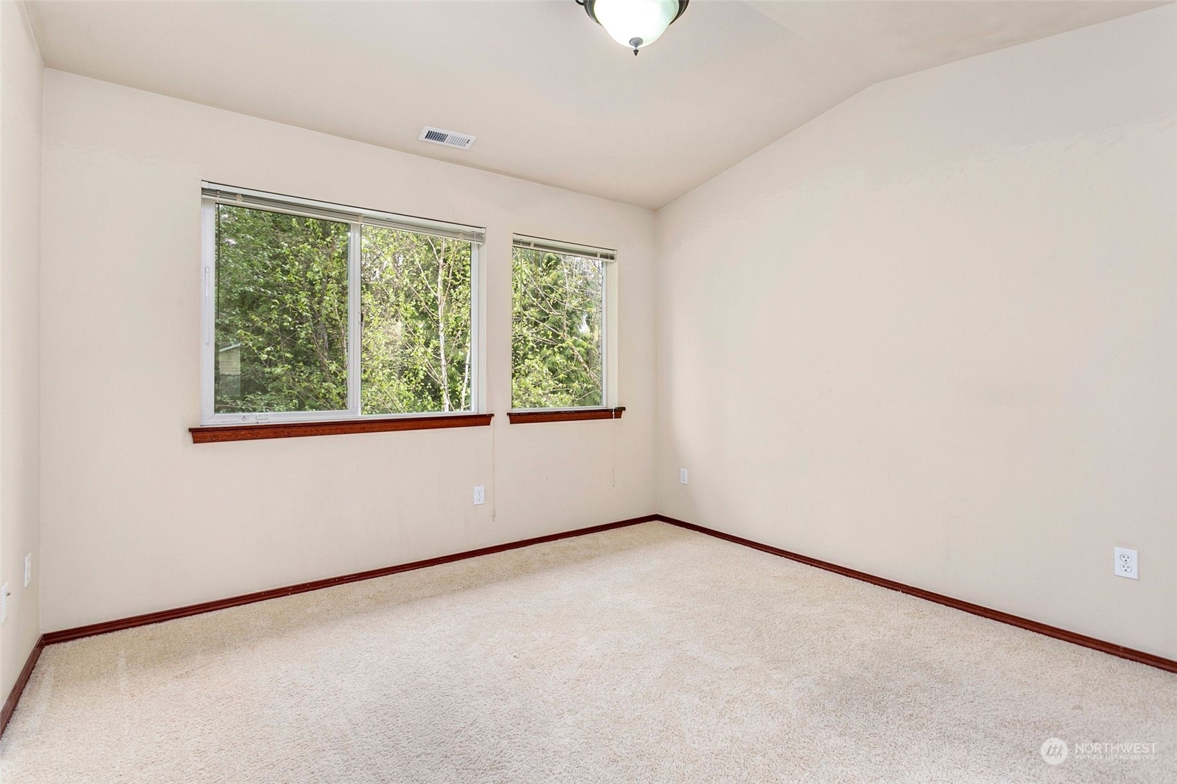 1137 215th Place Southeast Bothell, WA 98021 - Photo 17 of 30 an empty room with a window
