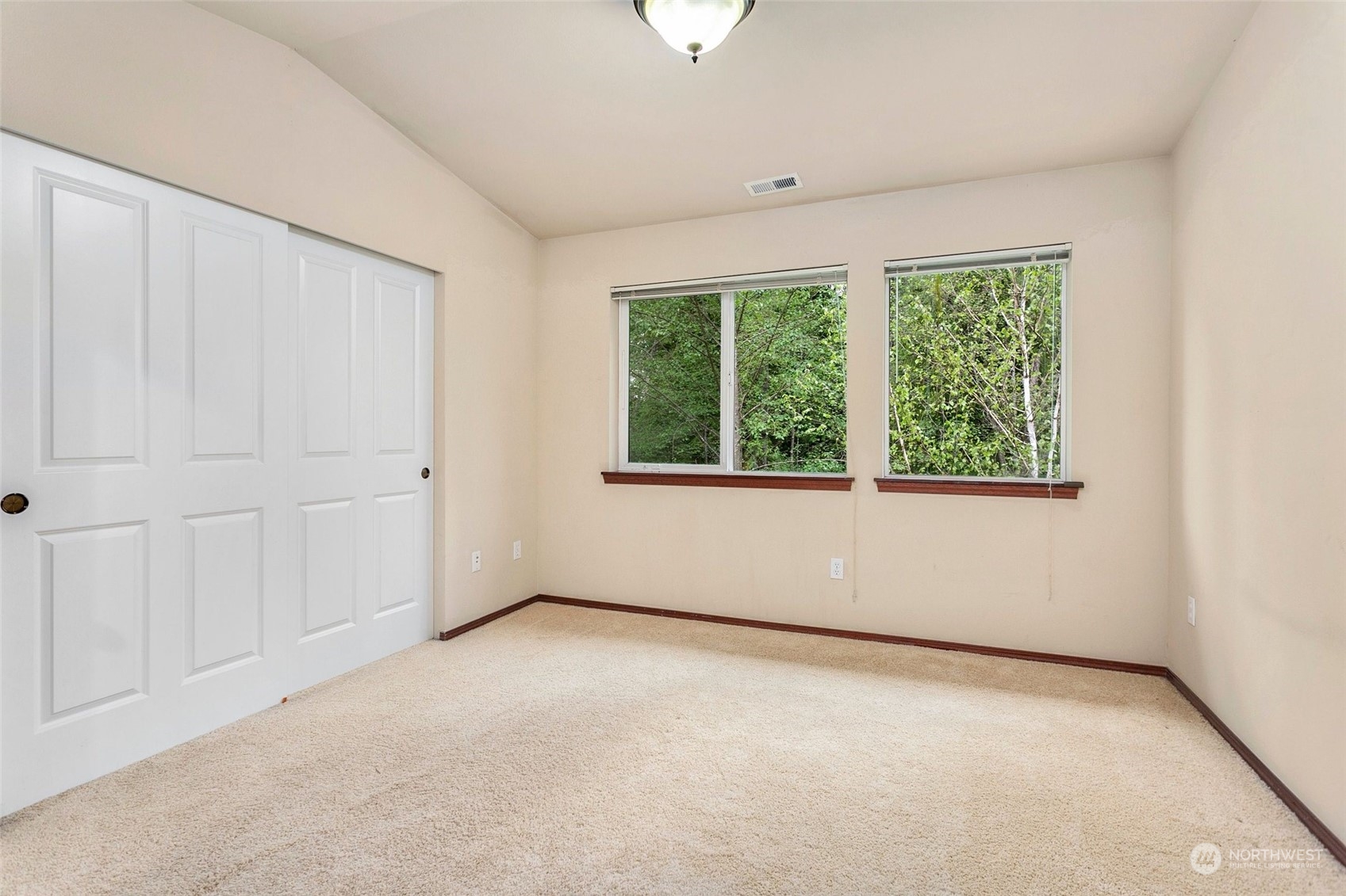 1137 215th Place Southeast Bothell, WA 98021 - Photo 18 of 30 an empty room with a window