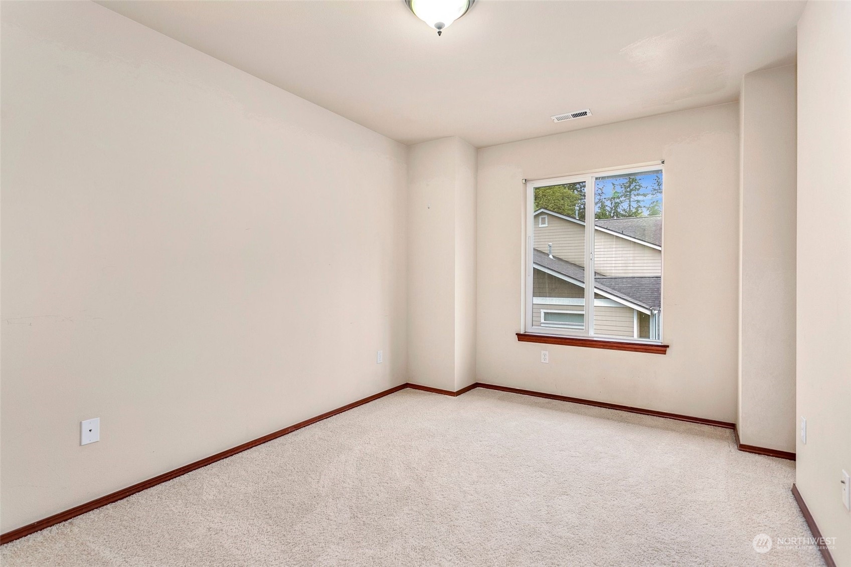 1137 215th Place Southeast Bothell, WA 98021 - Photo 22 of 30 an empty room with windows