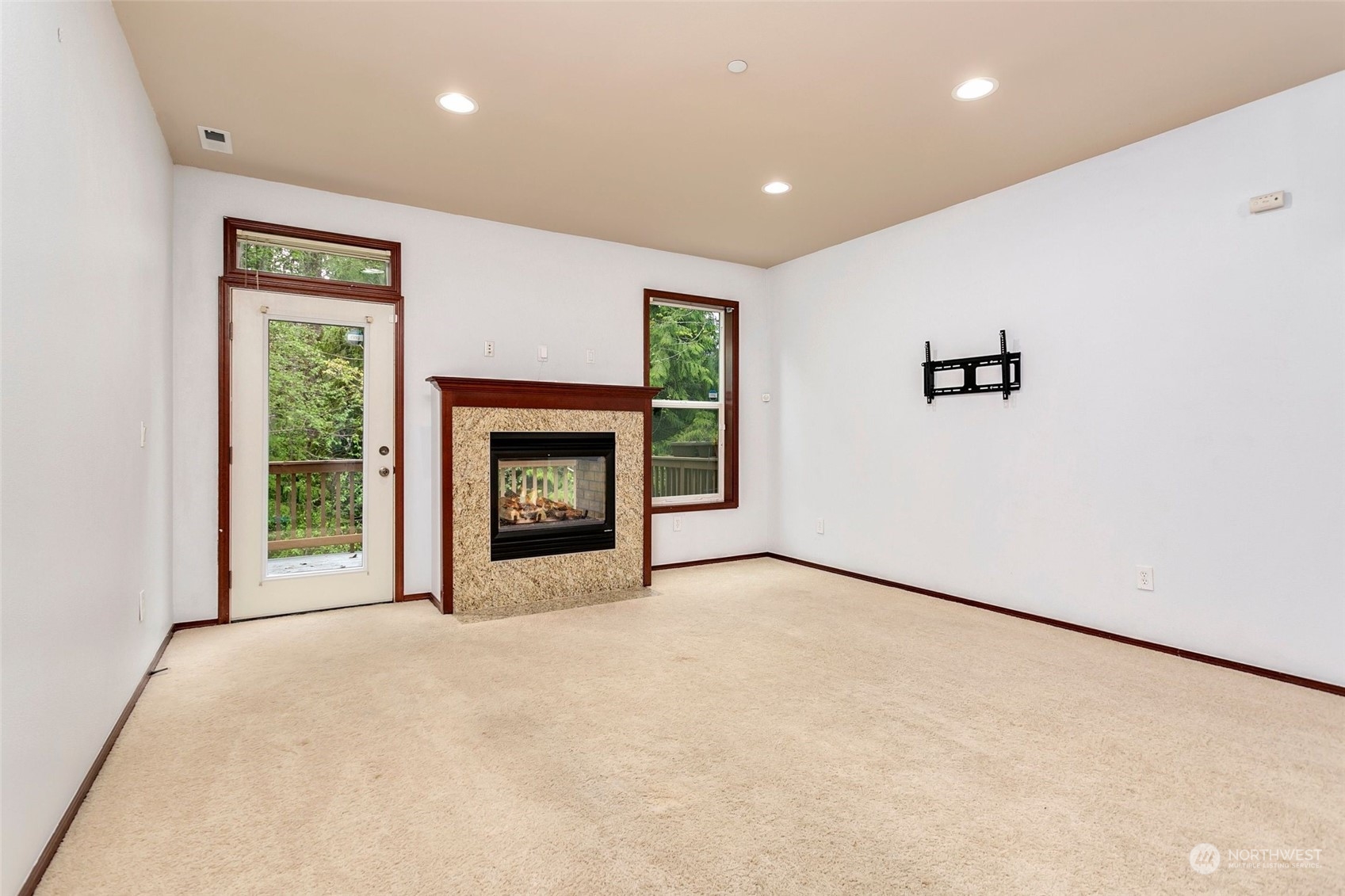 1137 215th Place Southeast Bothell, WA 98021 - Photo 6 of 30 a view of empty room with a fireplace