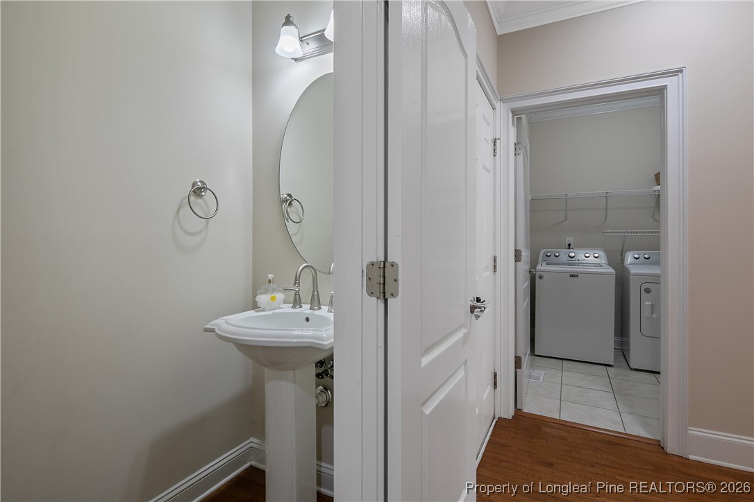2721 Plum Ridge Road Fayetteville, NC 28306 - Photo 21 of 50 a bathroom with a sink a toilet and shower