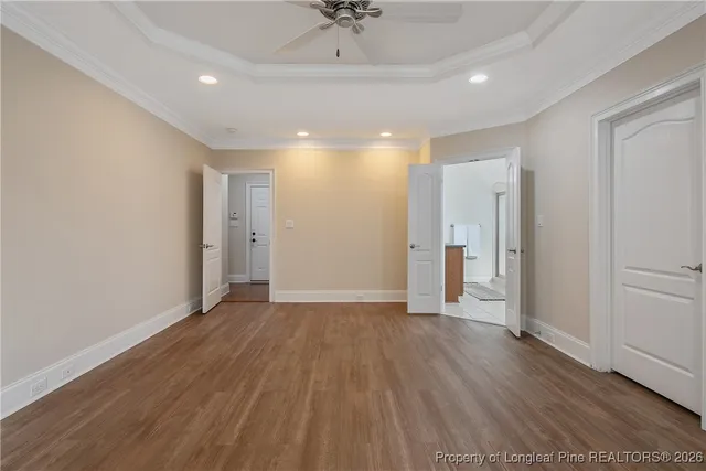 a bathroom with a granite countertop sink and a bathtub