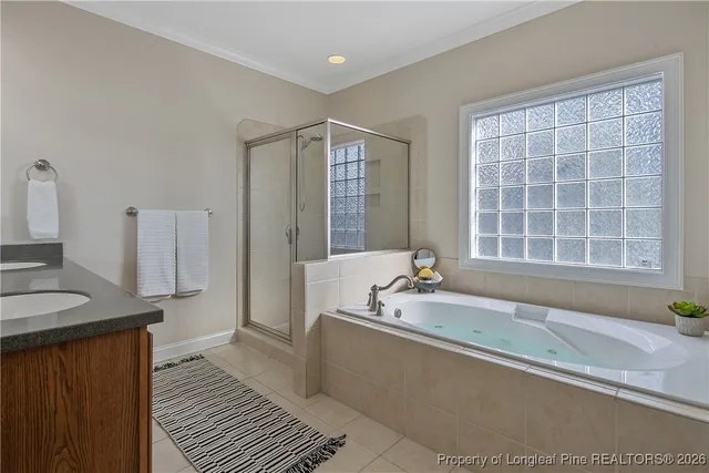 a bathroom with sinks a vanity and a mirror