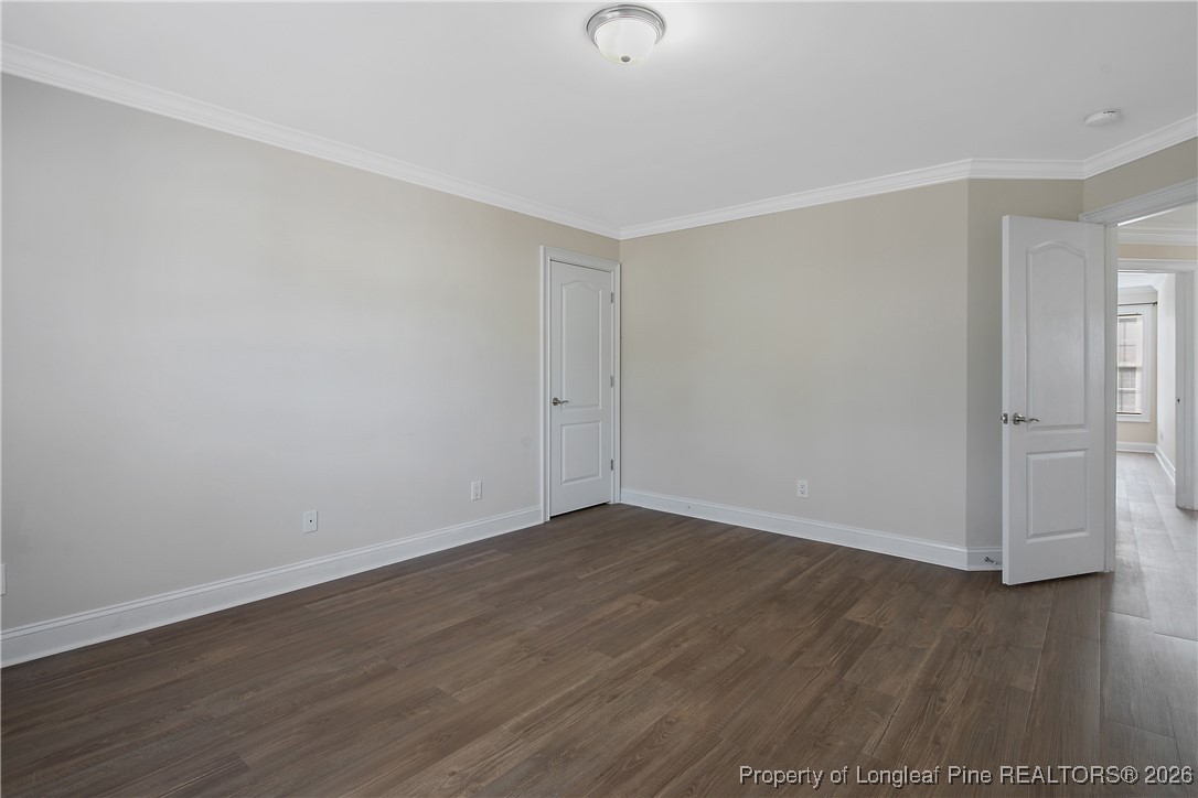 2721 Plum Ridge Road Fayetteville, NC 28306 - Photo 39 of 50 a view of an empty room with wooden floor